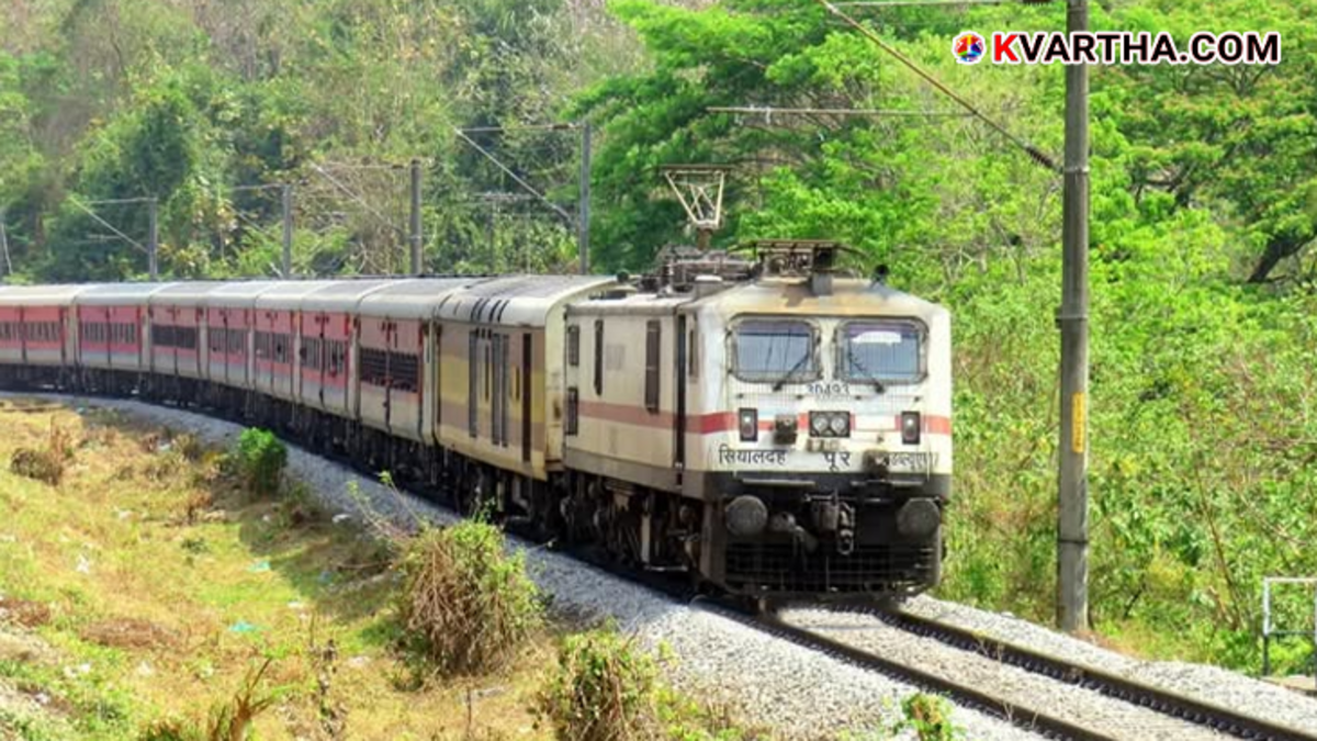 Antyodaya Express train at a railway station in Kerala.