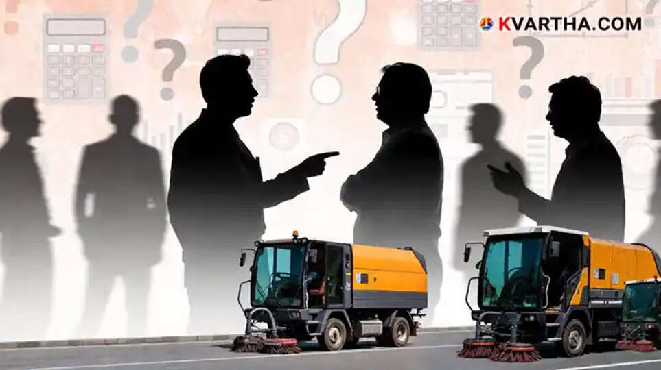 A motorized road sweeping machine cleaning a street in Bengaluru