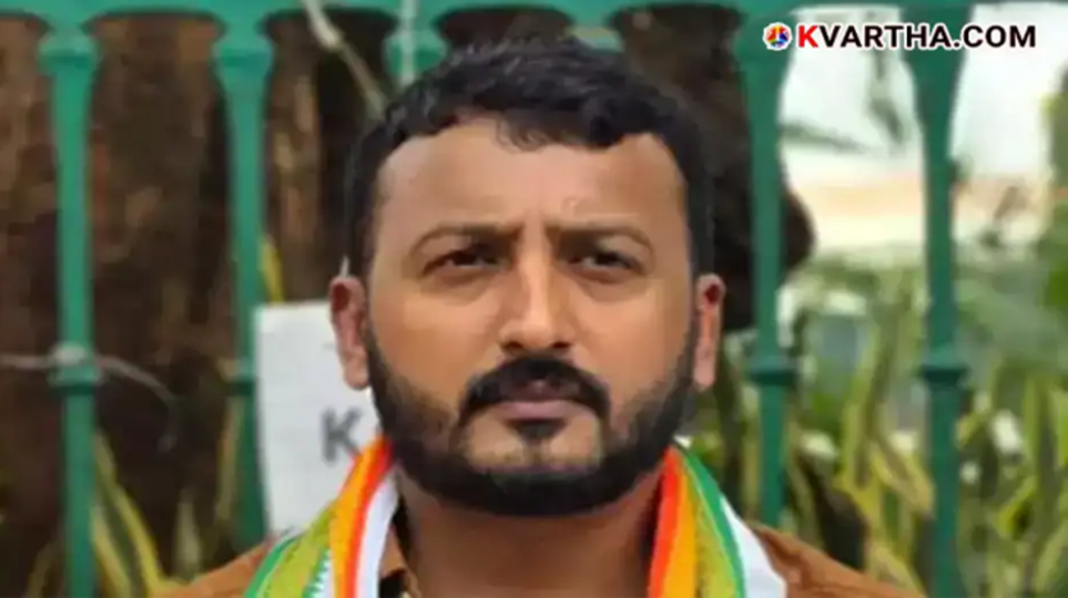  Rahul Mamkootathil MLA in a white shirt, portrait view.