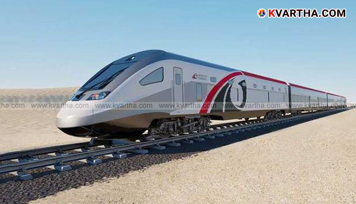  Etihad Rail train on tracks in the desert.