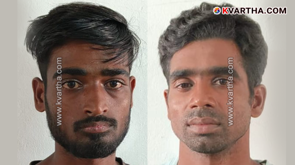 Police arresting two men for railway cable theft.