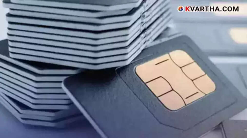 A person holding a fake SIM card