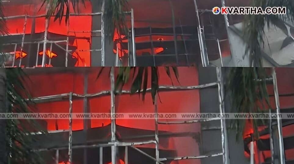 Fire department officials inspecting the site of the fire accident at Jayalakshmi Silks.