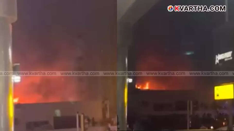 Smoke billowing from a building in Al Barsha, Dubai after a fire incident.