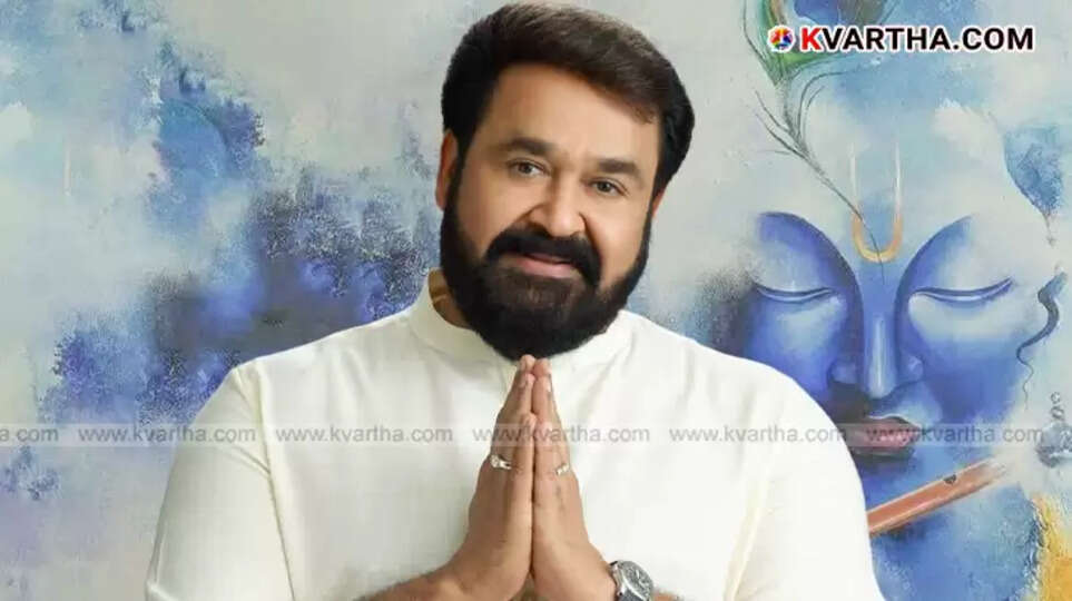  Malayalam actor Mohanlal smiling and posing for a picture.