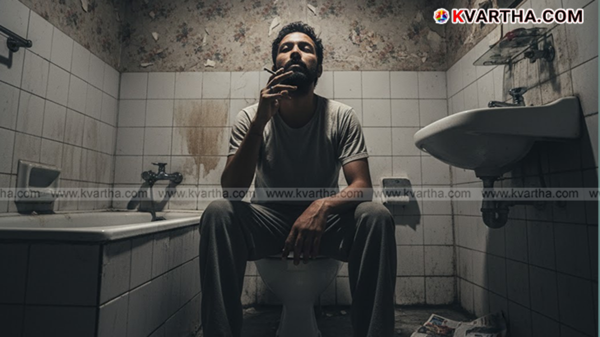 Man secretly smoking in a poorly ventilated bathroom