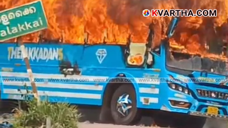 A private bus fully engulfed in flames on the roadside at Valakkai, Kannur.