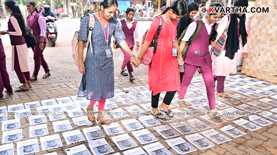 SFI student protest 'Foot on Rahul' with MLA Rahul Mankootathil's photo on the ground.