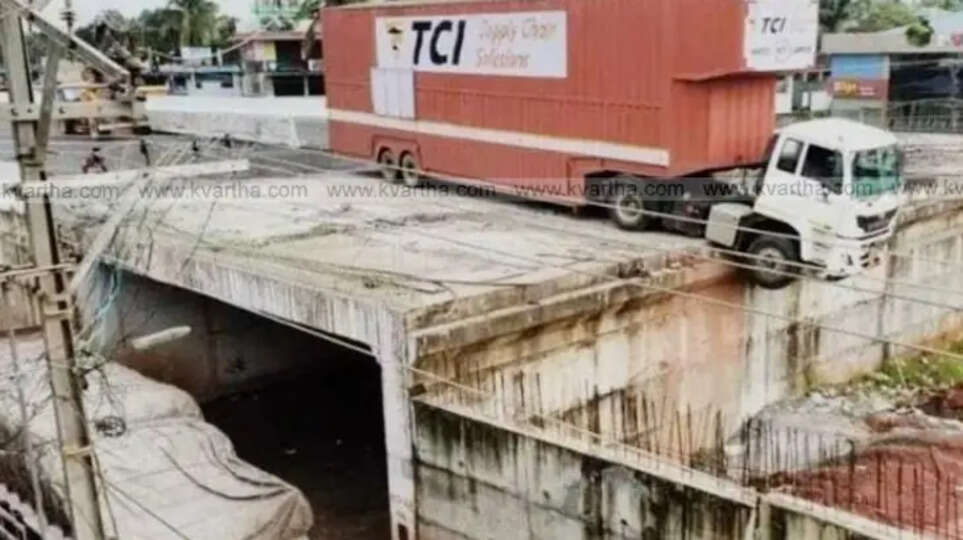 container lorry stuck on underpass