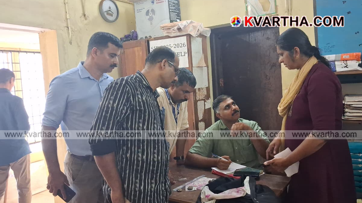 Vigilance officials arresting the accused at Uppala.