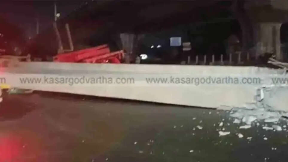 Damaged auto-rickshaw after the iron rail fell during Namma Metro construction.