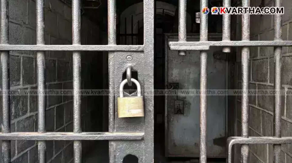 A man being arrested, representing the police action against cybercrime in Bengaluru Metro.