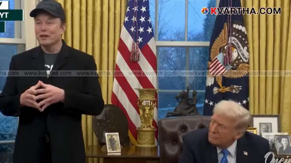 Protesters holding signs during a demonstration against Donald Trump in Washington D.C.