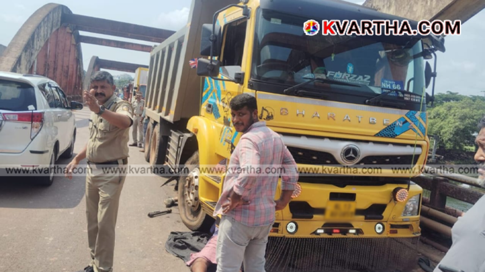 A huge traffic jam on a national highway bridge due to a broken down lorry.