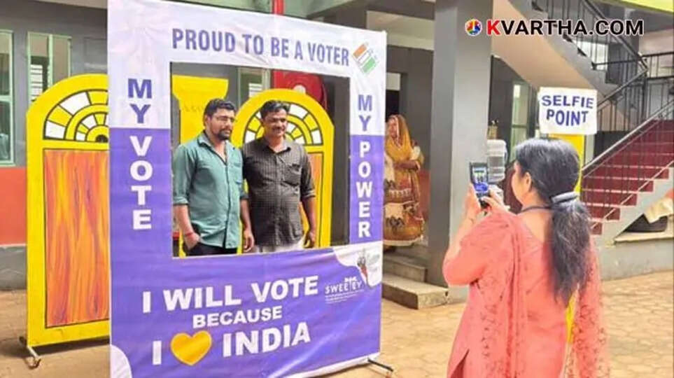 A voter taking a selfie at a polling booth