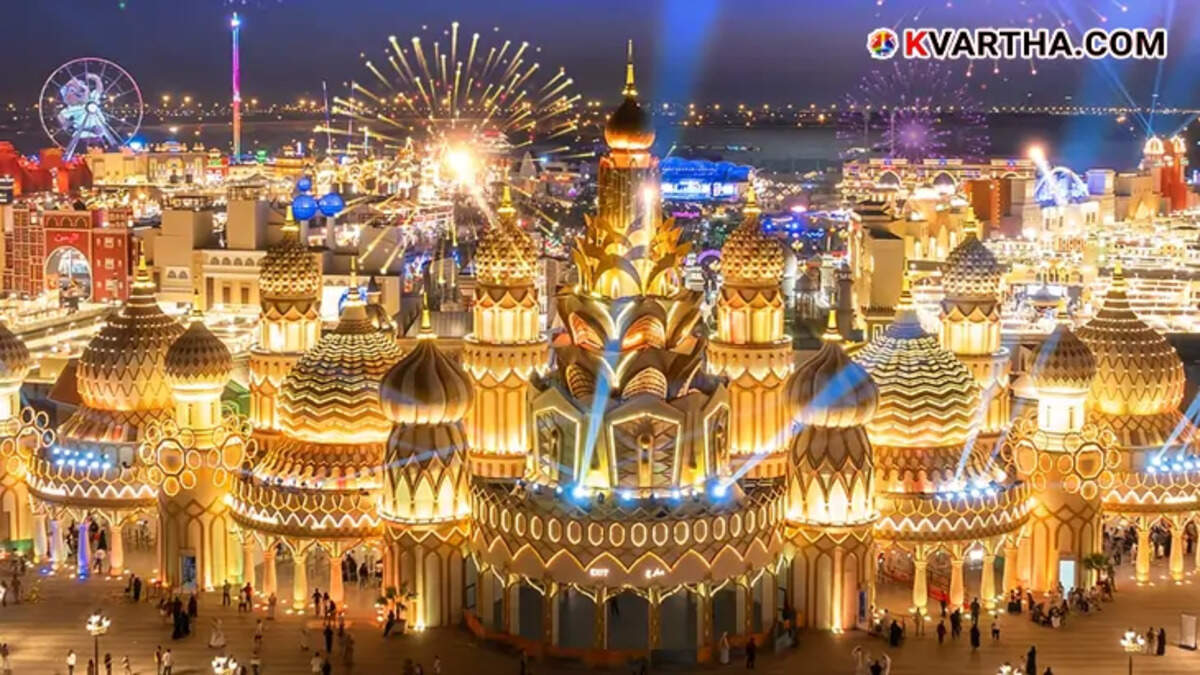 A vibrant night view of Dubai Global Village with lights and attractions.