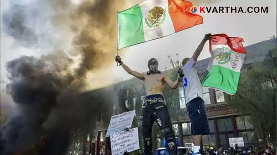 Large crowd of protestors demonstrating in downtown Los Angeles.