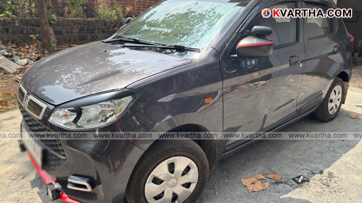  A car caught in fire at Taliparamba open ground.