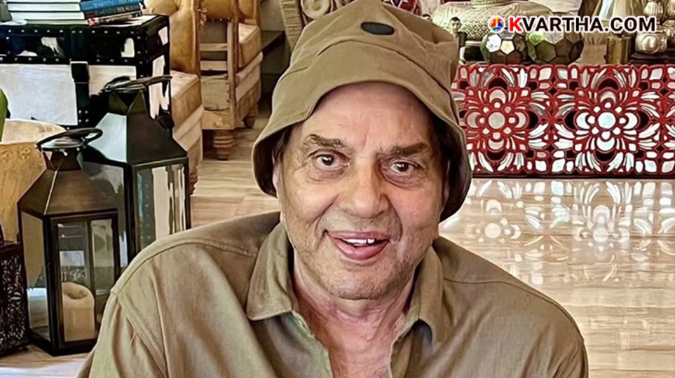 Close up of actor Dharmendra smiling.