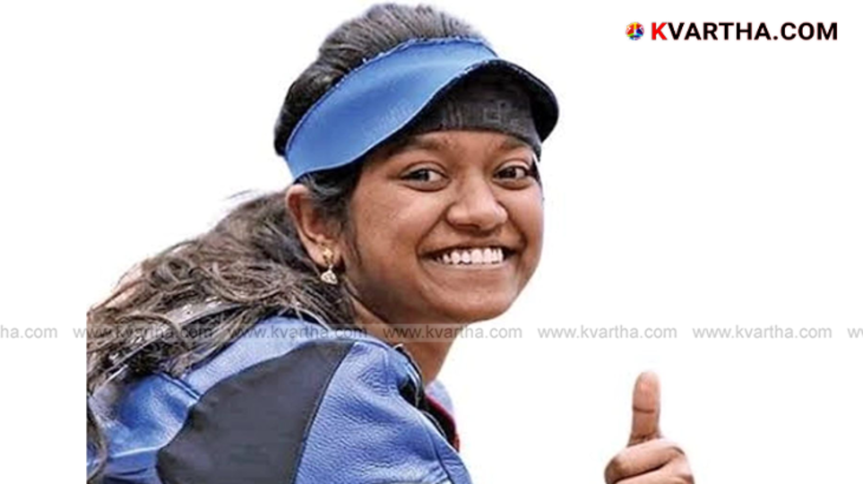 Elavenil Valarivan with gold medal after winning at Asian Shooting Championship.