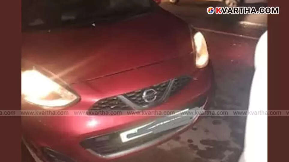  Police vehicle with a car in custody, indicating an accident or arrest scene.