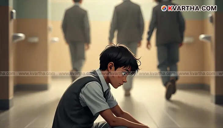 A schoolboy with scratches on his face sits alone on the floor in bathroom.