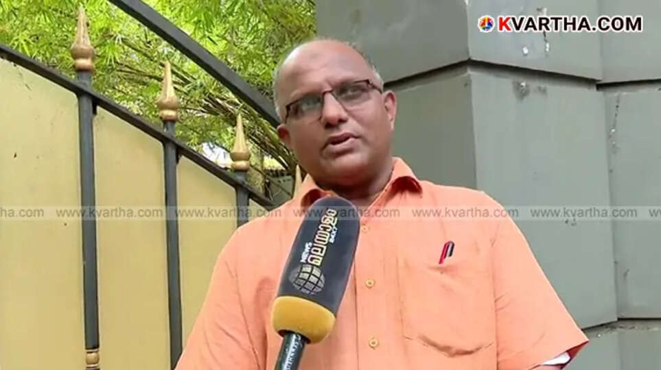 Image of Workshop Manager speaking to media.