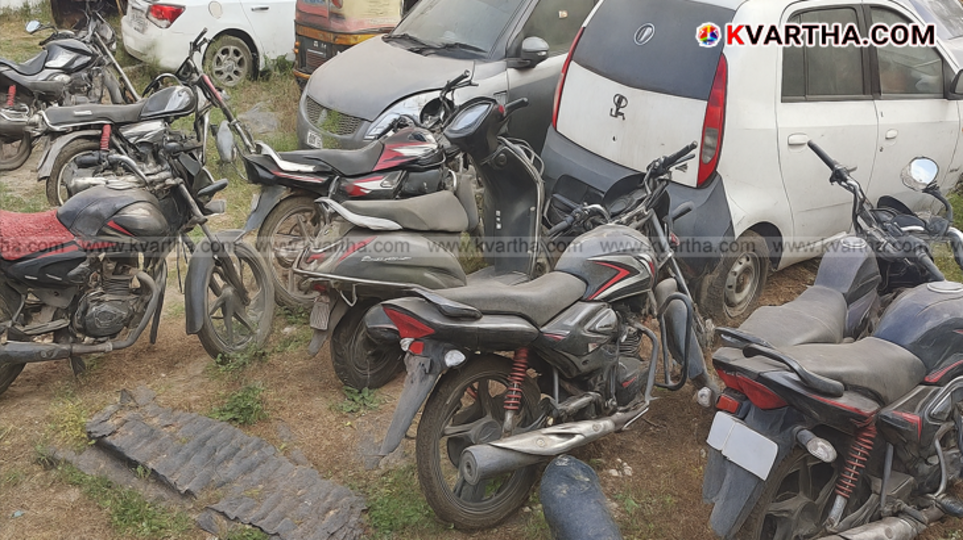 Rusting seized vehicles parked outside a police station in Kerala.