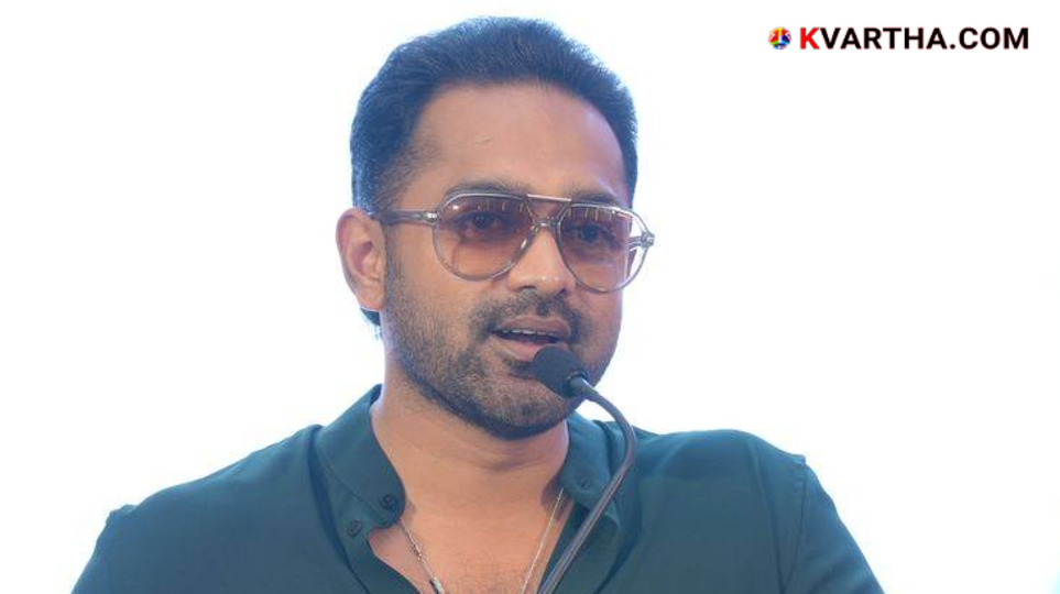 Actor Asif Ali and Ramesh Pisharody smiling during a discussion about the Palakkad election.