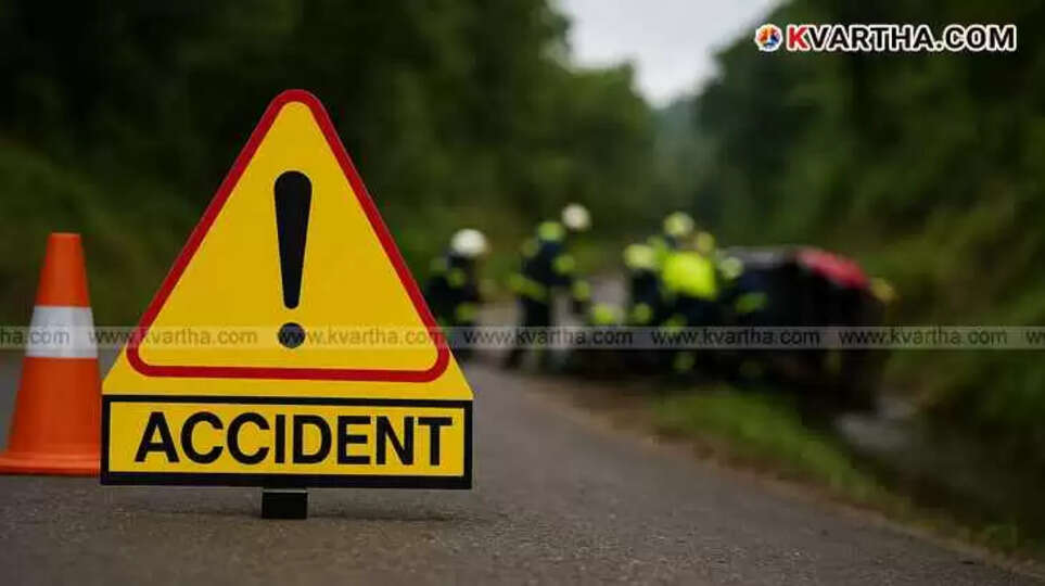 An accident warning sign on a roadside with blurred emergency responders assisting an overturned auto rickshaw in the background.