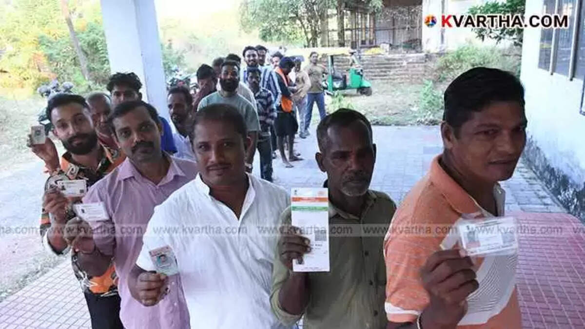 Voters queueing at a Kerala local election polling booth