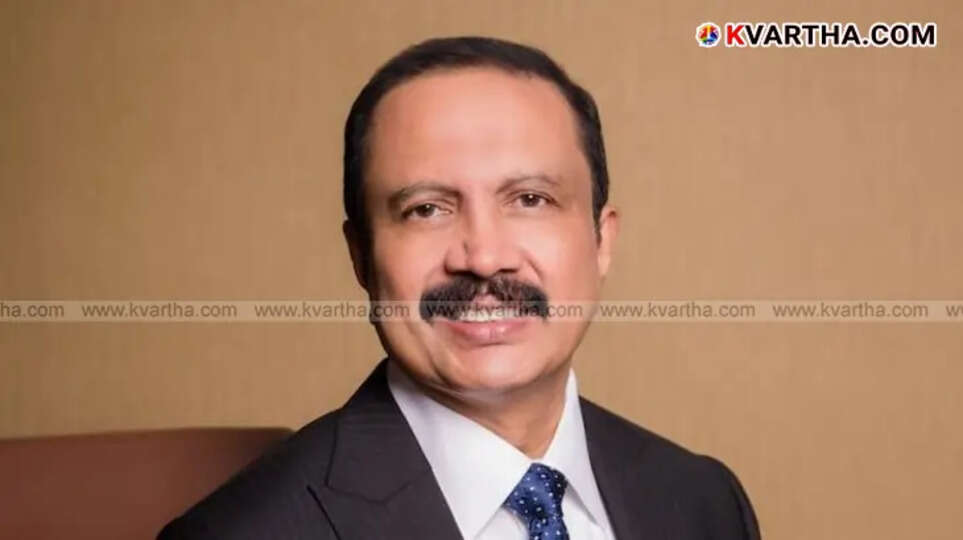 Dr. Azad Moopen, Chairman of Aster DM Healthcare, looking professional.