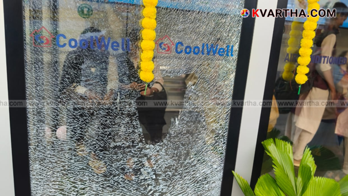 Broken glass of high-tech AC bus shelter in Kannur Caltex