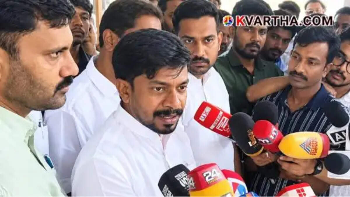 Image reflecting Kerala Minister OJ Janeesh addressing media