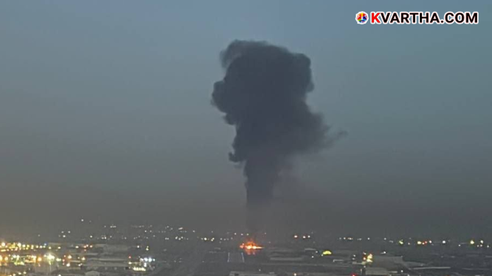 Stock market screens in Seoul showing red as markets crash by 12% due to war