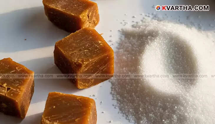 Pieces of jaggery and white sugar side by side.