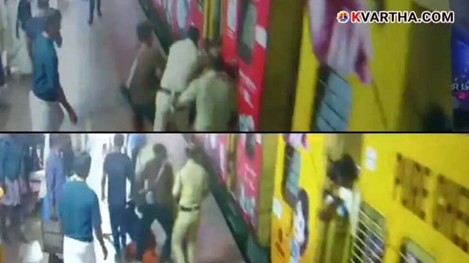  Railway police rescuing fallen passenger in Kannur