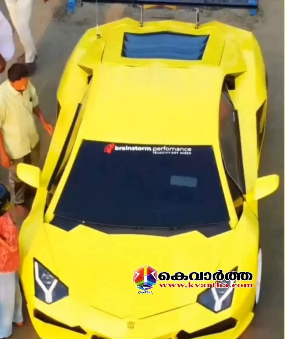 Sarin posing with his handcrafted yellow miniature Lamborghini car.