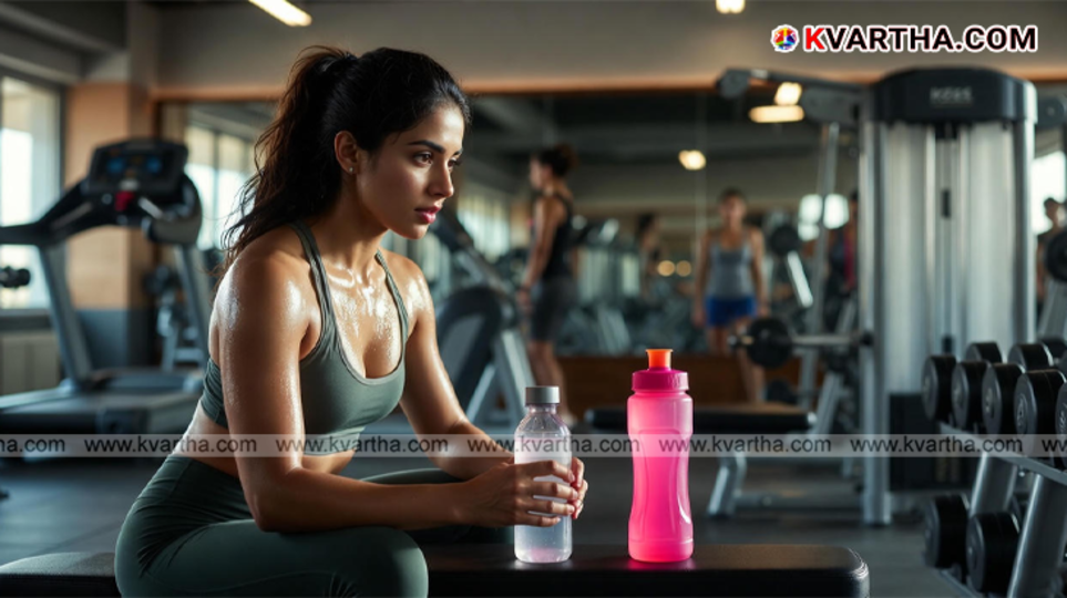 Man drinking water during gym workout session