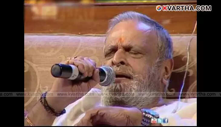 Jaya Chandran performing on stage, Malayalam music legend