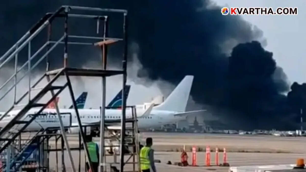 Black smoke rising from Dhaka Airport Cargo Complex after a fire