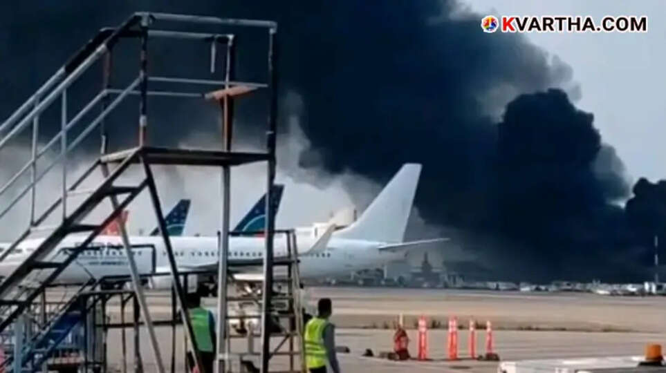Black smoke rising from Dhaka Airport Cargo Complex after a fire