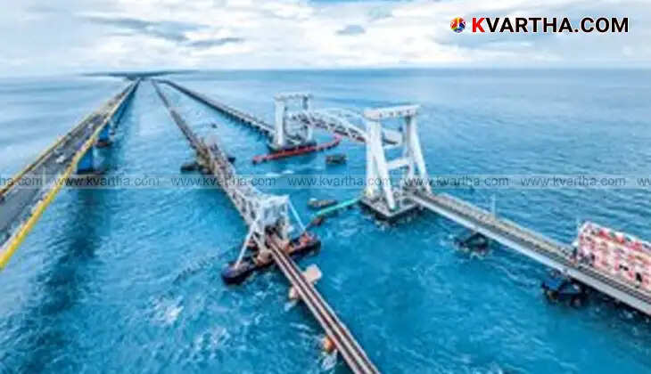 Panoramic view of the new Pamban Railway Bridge, with train crossing over the sea.