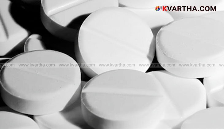 A stock photo of medicine strips and tablets, symbolizing the price reduction.