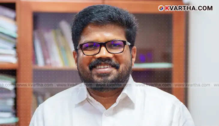 KK Ragesh speaking at a press conference. 