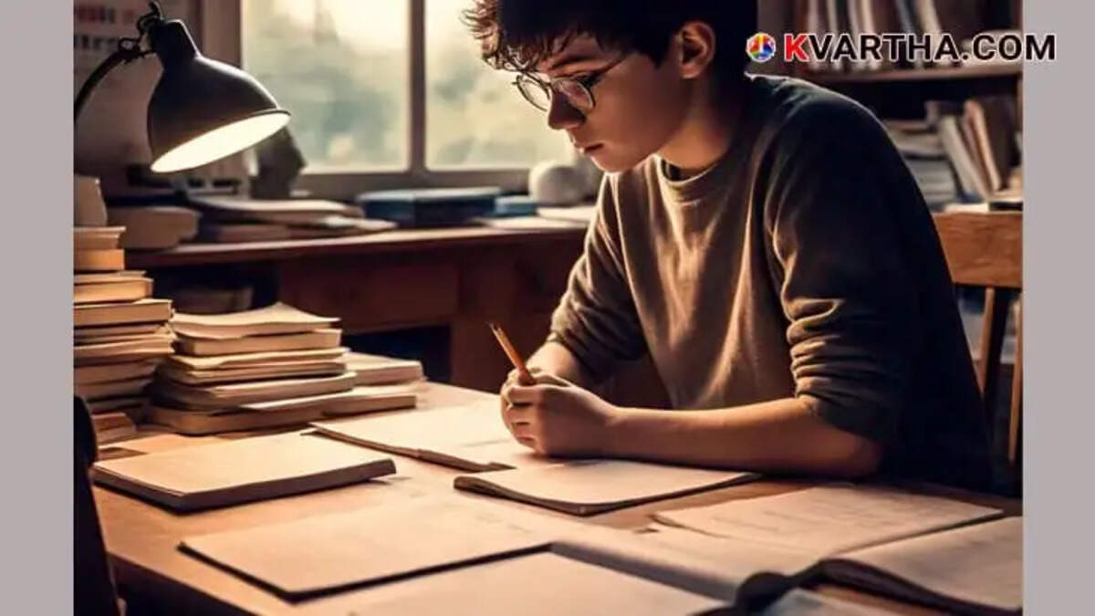 Student studying in a library, surrounded by books and computers