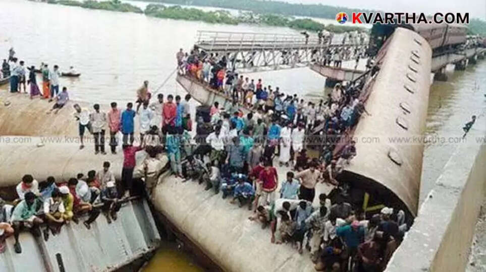 Debris of the train and collapsed bridge at the Kadalundi disaster site in Kozhikode, Kerala.