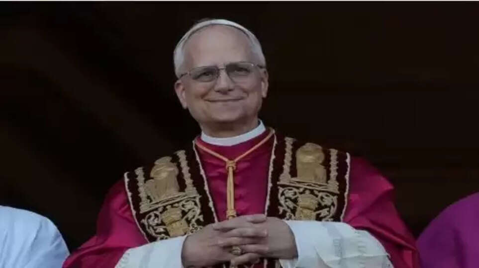 Pope Leo XIV waves to the crowd in St. Peter's Square.