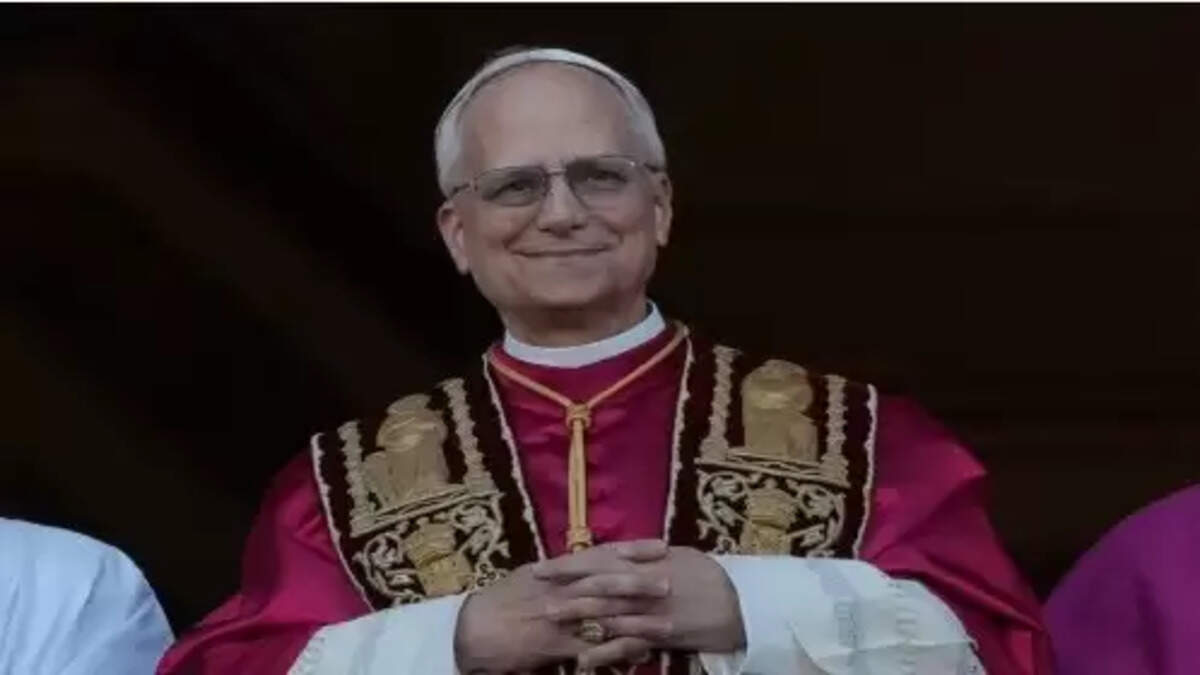 Pope Leo XIV waves to the crowd in St. Peter's Square.
