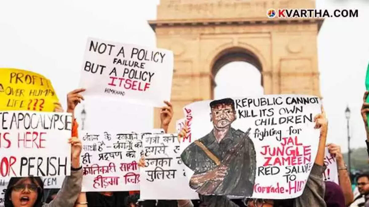 Crowd holding Madhavi Hidma poster at Delhi pollution protest.
